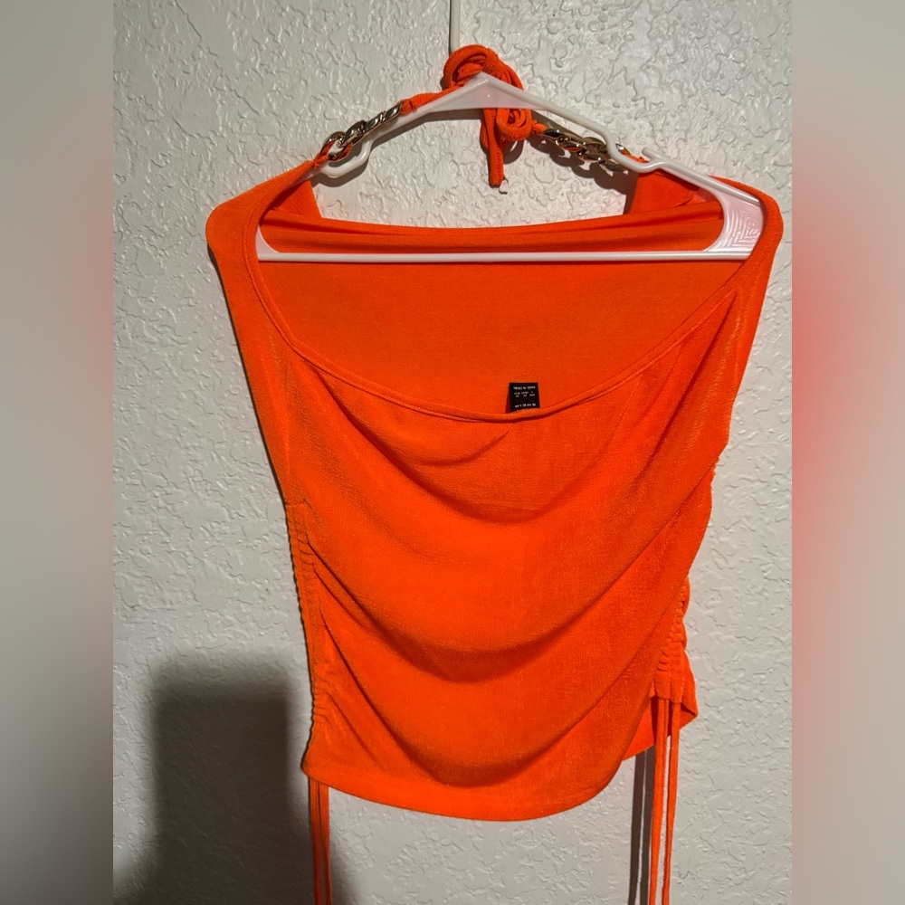 5/$15bundle item. Orange halter top NWOT